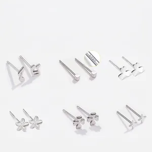 Set of 999 sterling silver stud earrings featuring star, moon, and floral designs