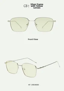 Detailed view of silver metal square sunglasses with yellow lenses and wavy carved temples