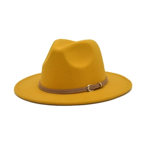 Detail of the yellow wool felt fedora with a brown leather belt and gold buckle