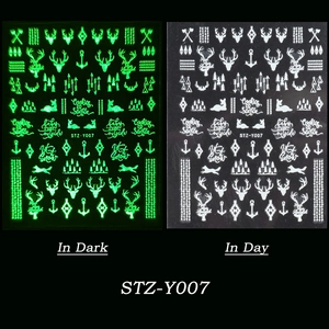 Glow in the dark Christmas nail stickers with snowflakes and reindeer patterns for DIY art