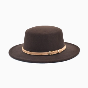 Detailed close-up of brown wool fedora hat with a leather belt and golden buckle