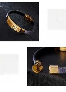 Dettaglio del bracciale in pelle da uomo con piastra dorata a sbalzo e fibbia in acciaio