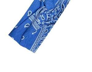 Close-up of blue paisley pattern fabric and texture on wide athletic headbands