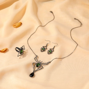 Gothic spider jewelry set with green gemstones, necklace, earrings and ring for Halloween
