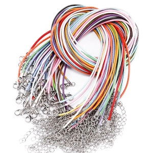 Close-up of colorful mixed wax cord necklace straps with metal lobster clasps and chains