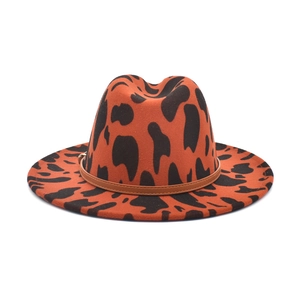Orange cow print fedora hat with a wide brim and brown leather band for men and women