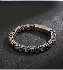 Macro detail of 316L stainless steel Byzantine square chain with durable clasp