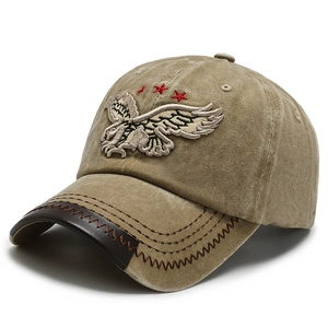 Khaki washed denim baseball cap with eagle embroidery and faux leather brim detail