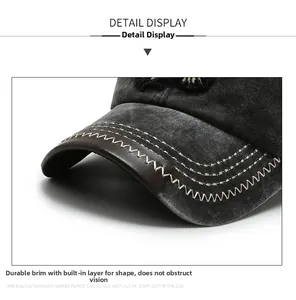 Detail of washed cotton baseball cap featuring a leather brim with sturdy contrast stitching
