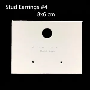 White earring display card with hanging hole and nyunyu text measuring 8x6 centimeters