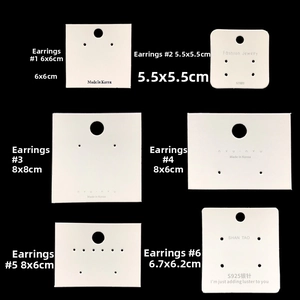 Multiple sizes of professional white jewelry display cards for earrings and necklaces