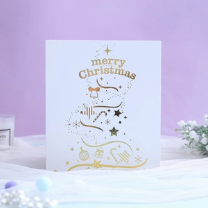 3D Christmas greeting card with gold foil merry Christmas text and festive design