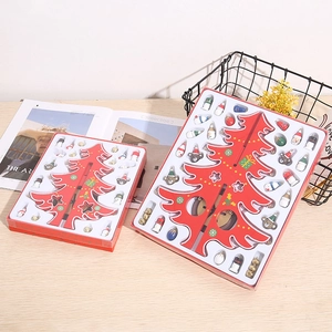 DIY red wooden Christmas tree advent calendar with small Santa and snowman figurines