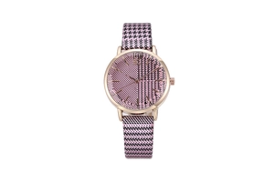 Detailed view of pink and black houndstooth pattern leather strap on a rose gold watch