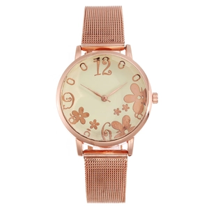 Elegant rose gold women's watch featuring a floral pattern dial and Milanese mesh band