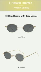 Close-up of golden metal oval sunglasses frame with gray lenses and wavy temple detail