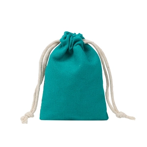 Close-up of turquoise cotton canvas drawstring bag with off-white rope texture