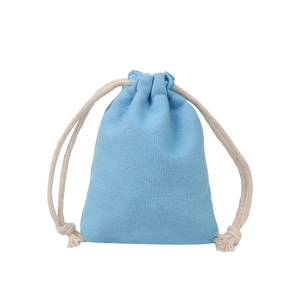 Close-up of small sky blue canvas drawstring pouch with high-quality fabric texture
