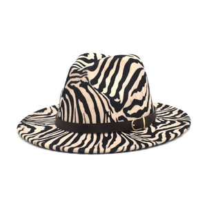 Detail of zebra pattern wool fedora hat featuring a brown leather belt with gold buckle