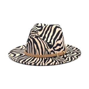 Classic zebra print fedora hat with a stylish brown leather band and gold buckle detail