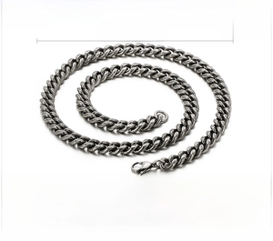 Detailed view of 10mm wide vintage stainless steel Cuban link chain with dimensions