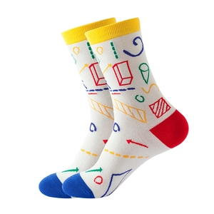 White cotton crew socks with vibrant geometric graffiti patterns and colorful trim
