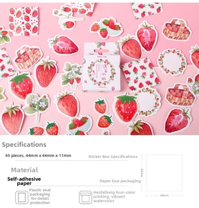 Close-up of 45-piece strawberry themed stickers set in box for DIY scrapbooking decor
