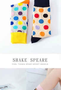 Detail of colorful polka dot cotton crew socks featuring vibrant knit patterns and soft texture