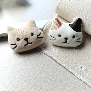 Cute plush cat brooches in light brown and calico patterns with detailed embroidery
