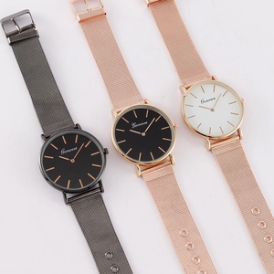 Three minimalist Geneva quartz watches with stainless steel mesh straps in various finishes