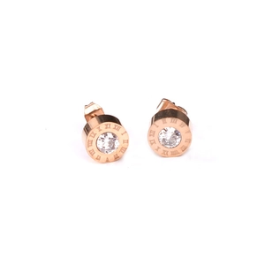 Elegant rose gold Roman numeral earrings with clear zircon stones on a white backdrop