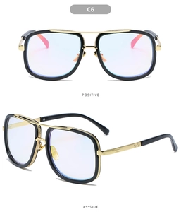 Front and 45-degree side views of black and gold oversized pilot style sunglasses