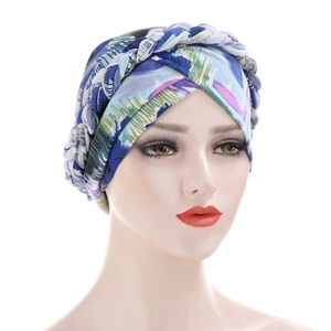 Detailed view of colorful tie-dye milk silk turban with braided twist and secure wrap
