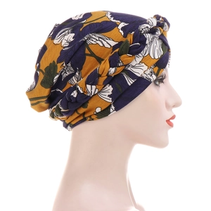 Tie-dye floral yellow turban with braided trim for women made of soft brushed fabric