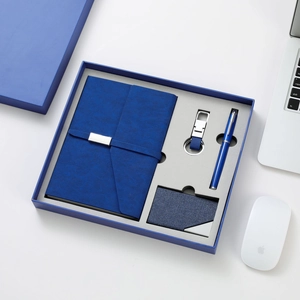Royal blue business gift set including leather notebook, pen, card holder and keychain
