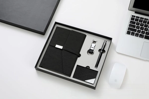Business gift set featuring black PU notebook, metal key ring, pen, and card holder