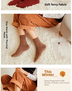 Detail of warm thickened wool blend socks in brown and dark red for winter comfort
