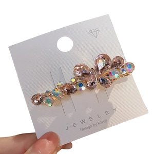 Golden butterfly hair clip with pink K9 crystals and sparkling rhinestones for women