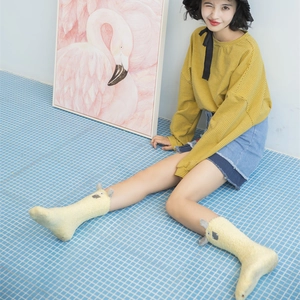 Cute yellow monster coral fleece socks in warm alpaca style for home and sleep wear