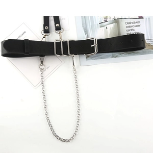 Detail of black PU leather punk belt featuring silver metal chains and square buckles