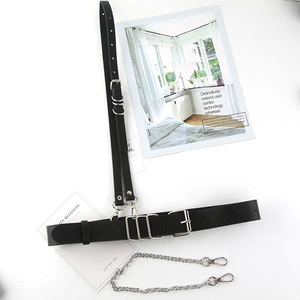 Detail of adjustable black PU leather body chain with detachable silver metal chain links