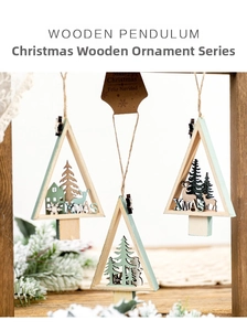 Detailed view of wooden Christmas tree pendants with reindeer and snowman scenes