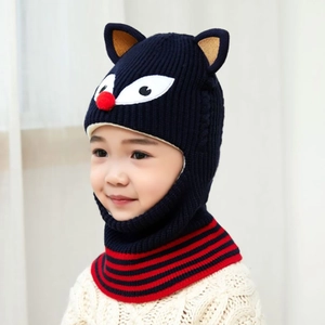 Detail of navy blue kids knitted cartoon hat with cozy fleece lining and red stripe scarf