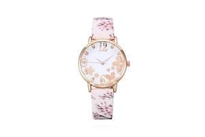 Detail of quartz watch with floral dial art and pink cherry blossom pattern strap