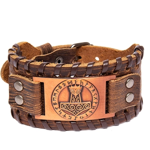 Vintage brown leather Viking Thor hammer bracelet with bronze rune plate on white background