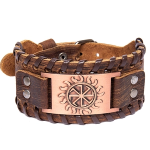 Brown leather Viking bracelet with Kolovrat sun symbol and copper finish metal plate