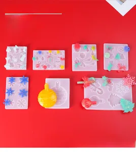 Silicone molds for Christmas DIY pendants including snowflakes, trees, and canes