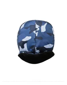 Top view of camouflage trapper hat showing durable fabric and thick faux fur lining