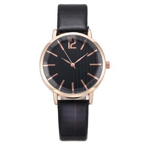 British style ladies quartz watch with black grid dial and rose gold accents