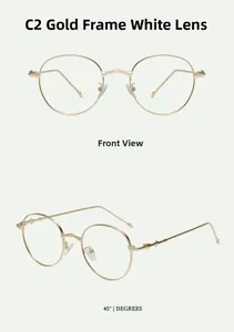 Close-up of vintage round metal gold frames with clear lenses from front and side angles